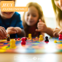Enfants jouant ensemble à un jeu de plateau