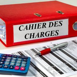 Photo d'un gros classeur Cahier des charges